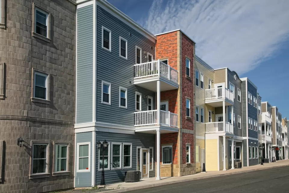 Colorful three-story multifamily housing.